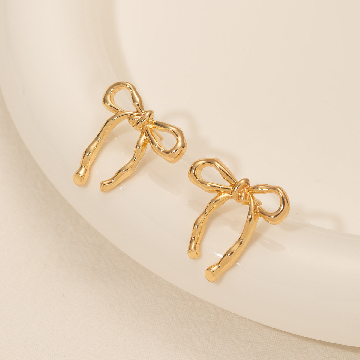 Gold Bow Stud Earrings